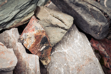 Sharp fragments of stones in the mountains on the rocks.