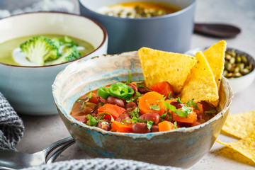 Set of vegan soups. Mexican bean soup, broccoli cream soup and mashed pumpkin soup.