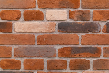 close-up of a reddish ceramic brick wall