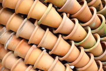 the row from many flowerpots of clay in Thailand 