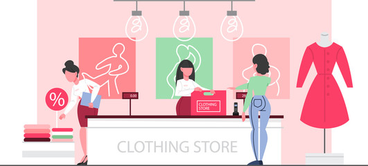 Clothing store interior. Woman standing at the counter in the clothing store