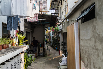 Fototapeta na wymiar A narrow street in Pokfulam Village, Hong Kong