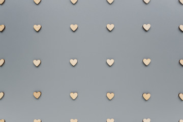 Small hearts on a gray background. Template of hearts for a holiday card. Lots of hearts for Valentine's day