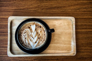 Coffee cup with latte art foam