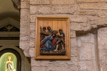 Wooden icon depicting Jesus Christ hanging on a wall of the Chapel of Saint Catherine in Bethlehem...