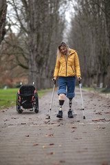 Strong disabled woman doing first steps.