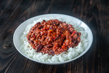 Chili con carne served with white rice