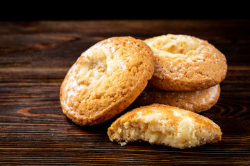 Cottage cheese (cheesecake) cookies on dark wooden background.