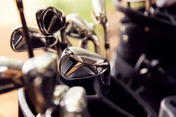 Poster Close Up Of Clubs In Bag On Golf Buggy © Monkey Business