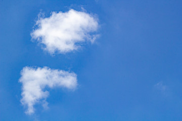 White fluffy cloud in the clear blue sky, White clouds on blue sky with blank space for your text.