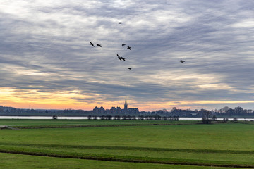 Sunset at river The Waal in The Netherlands