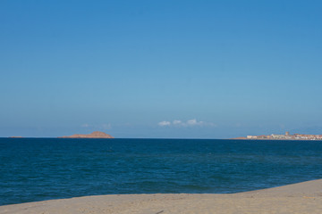beautiful panorama of the famous beaches of the Sardinian sea with the isola rossa and castelsardo ...