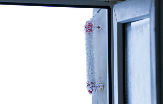 Ice Frost Thermometer With Frozen Sub Zero Temperature On The Window