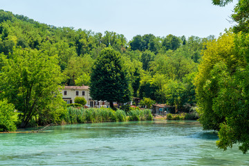Fototapeta na wymiar Idyllic landscape along the Mincio river near Valeggio. Province of Verona, Veneto, Italy