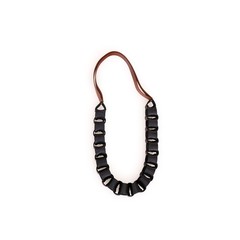 Handmade leather necklace isolated on a white background