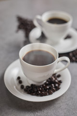 Hot coffee cup and coffee beans. .