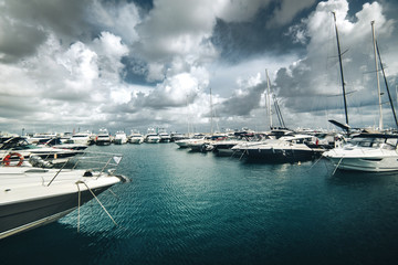 Fototapeta premium beautiful and luxurious yachts moored to the shore