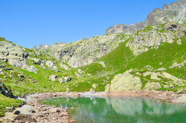 Alpine Lac de Cheserys, Lake Cheserys near Chamonix-Mont-Blanc in French Alps. Turquoise lake with...