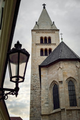 street lantern in front of an old building