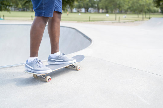 Man standing on skateboard