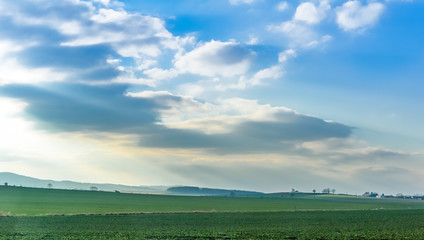 landscape with field and blue sky in Czech republic
