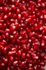 Fresh pomegranate seeds background photo