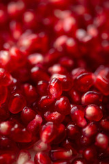 Fresh pomegranate seeds background photo