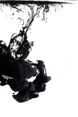 Black Smoke or black ink texture spread with white background