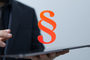paragraph law sign digital in hand