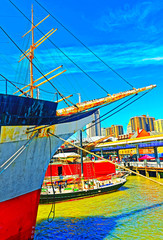 Obraz na płótnie Canvas Ship at Pier 17 and harbour of South Street Seaport with Skyline of Skyscrapers in Manhattan, New York City, America USA. American architecture building. Metropolis NYC. Cityscape. Hudson, East River