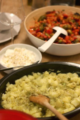 Mashed potatoes with olive oil, lemon and scallion, served on the table. Selective focus.