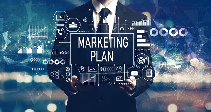 Marketing plan with businessman holding a tablet computer