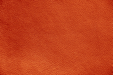 The texture of genuine leather. Impeccable and stylish background. Beautiful stylish background. Natural skin texture close up. Brown background. The structure of the leather material brown shades