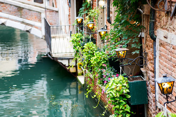 Lantern by cafe on a Grand Canal Venice Italy