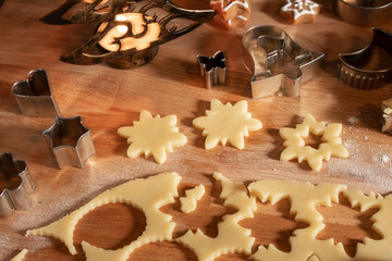 Cutting out star shapes for traditional Linzer Christmas cookies