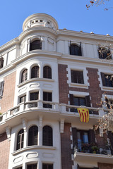 Corner Tower of Old Apartment Block with Balconies & Flag