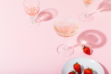 Close up of champagne and strawberries on table