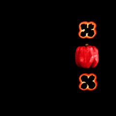 Collage set of fresh whole and sliced red bell peppers (paprika) isolated on a black background. View from above