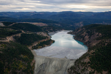 Aerial view of Copper Mine Tailing pond in the interior British Columbia, Canada. Taken during a fall season sunset.