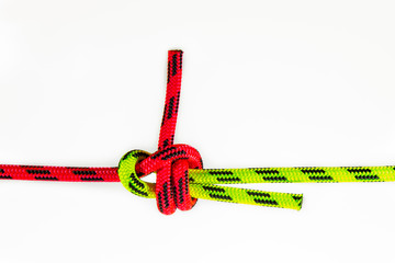 Double Sheet, becket bend or weaver's hitch binding two colored red and green ropes. knot use for...