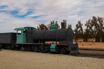 Train and carriages on the Hijaz Railway line at Mada'in Saleh (Hegra), Al Ula, Saudi Arabia 