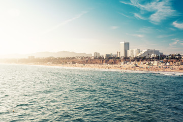 Santa Monica beach coastline in sunset light - obrazy, fototapety, plakaty