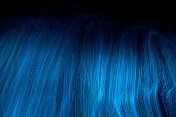 defocused luminous colored stripes, abstract chaotic interlacing of lines