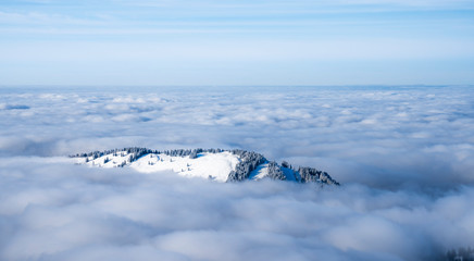 Winterlandscape in the Allgaeu Mountains, view from Hochgrat summit over a sea of fog to the...