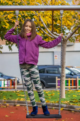 Little girl posing in park