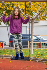 Little girl posing in park
