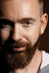 Fototapeta premium brutal man with a beard in the studio