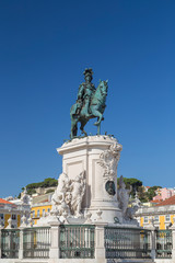 Obraz premium Statue of King Jose I at the Praca do Comercio square in Baixa district in Lisbon, Portugal, on a sunny day.