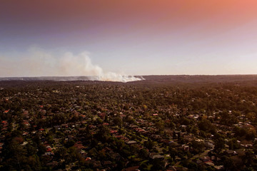Aerial view forest fire on the slopes of hills and mountains