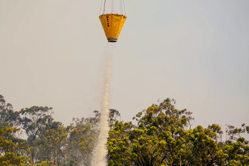 Aerial view forest fire on the slopes of hills and mountains